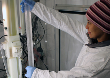 Monica Arienzo, Ph.D., an assistant research professor of hydrology at DRI, loads an 18,000-year-old sample of the WAIS Divide ice core for continuous chemical analysis