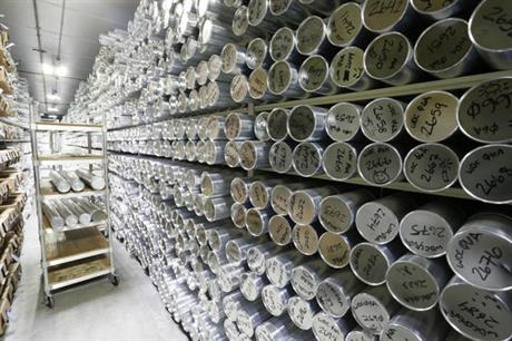 This Aug. 8, 2016 photo shows some of the thousands of frozen ice cores stored in canisters inside the minus-33 degree Fahrenheit environment of the archive warehouse at the National Ice Core Laboratory, in Lakewood, Colo
