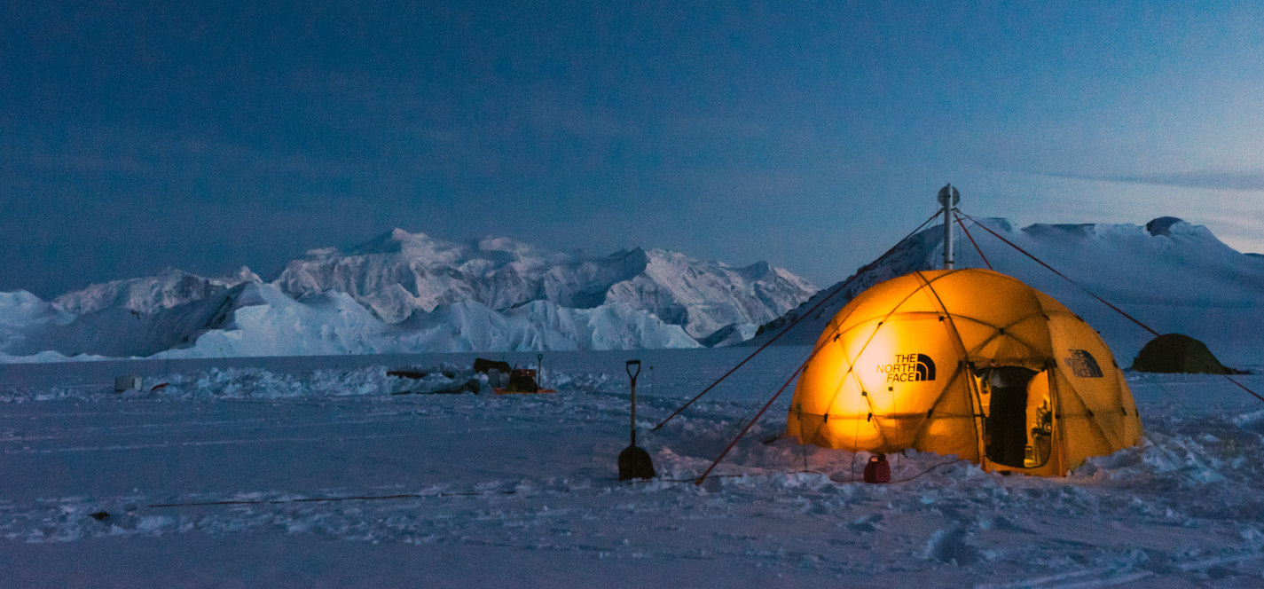 The researchers' ice drilling tent on the Eclipse Icefield, with Mt. Logan in the distant background