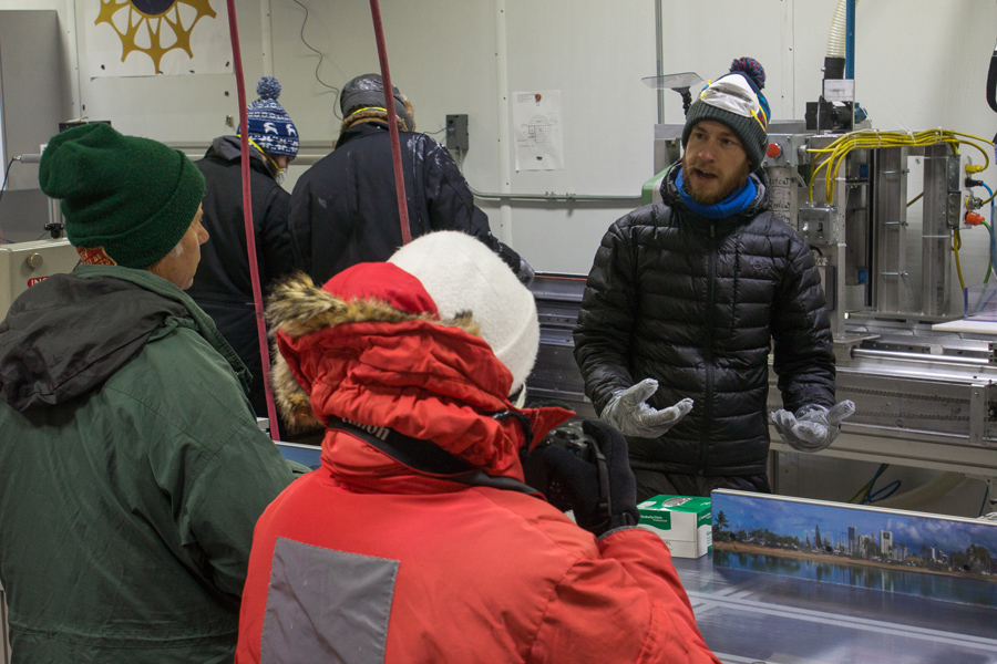 Luke Trusel of the Woods Hole Oceanographic Institute describes to School of Ice participants how he and his colleagues store and process ice cores at the National Ice Core Laboratory