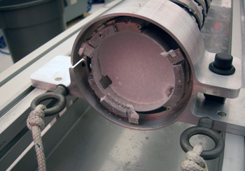 The coring head of the IDD drill showing the three cutting teeth and bottom of the ice core