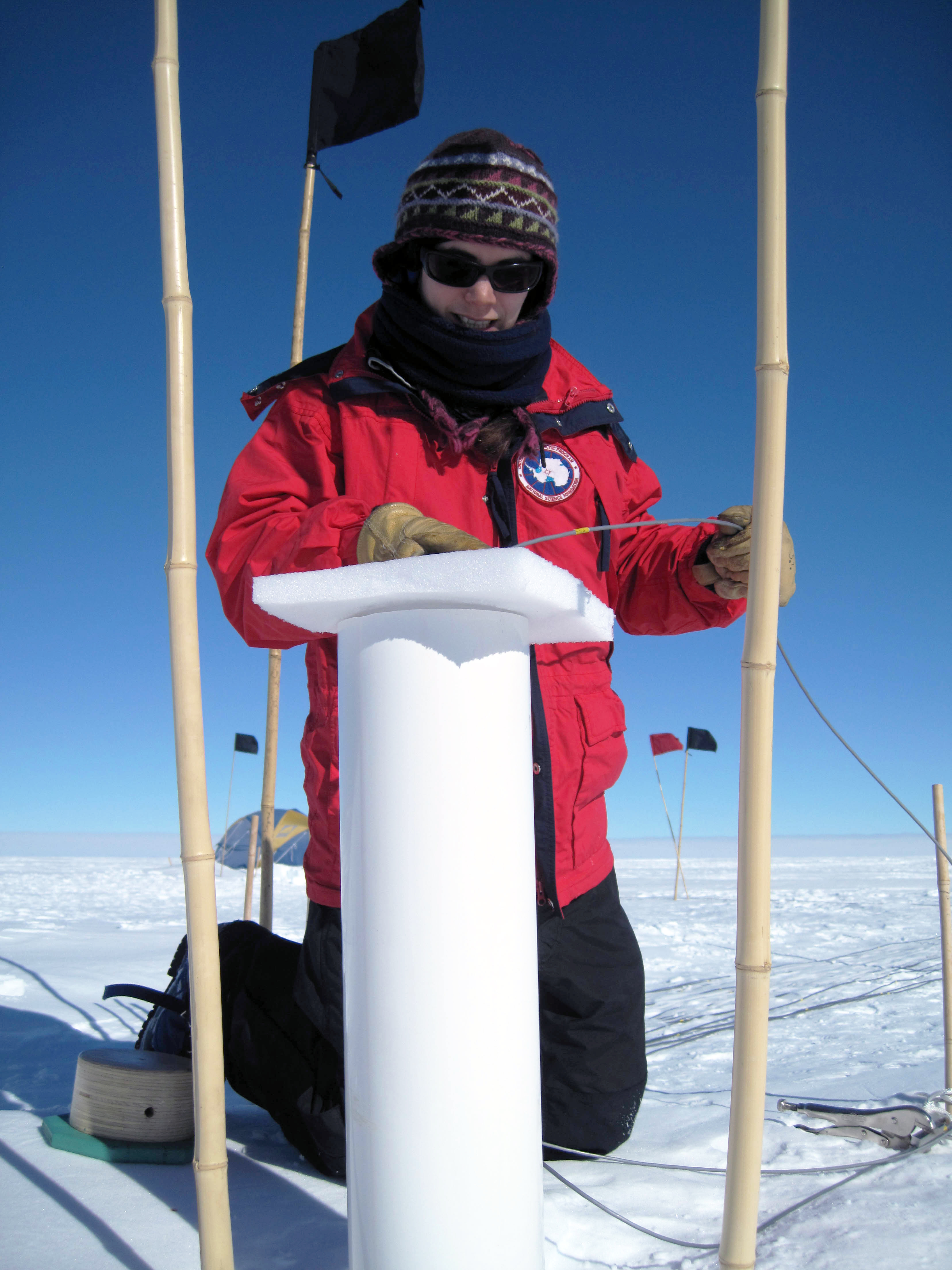 Anais Orsi adjusting the depth of the borehole thermometer at WAIS Divide, Antarctica