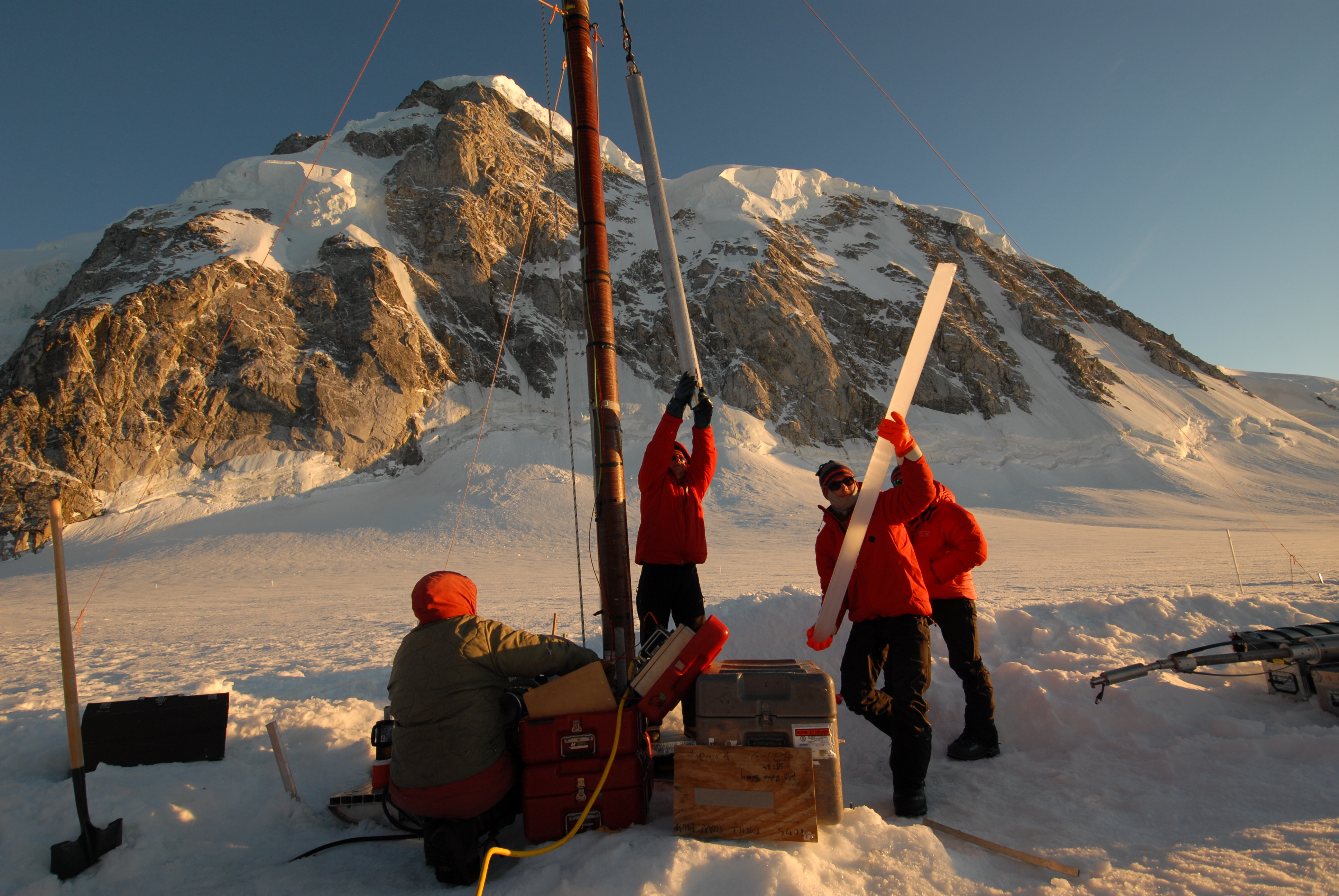 A 2-meter section of ice from Combatant Col is removed from the 3-inch Thermal Drill