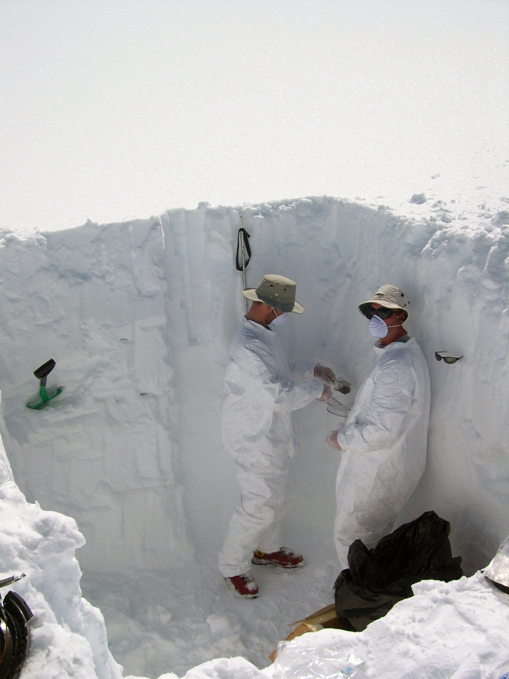 Eric Kelsey and Cameron Wake collect snowpit samples from the Upper Yetna Glacier