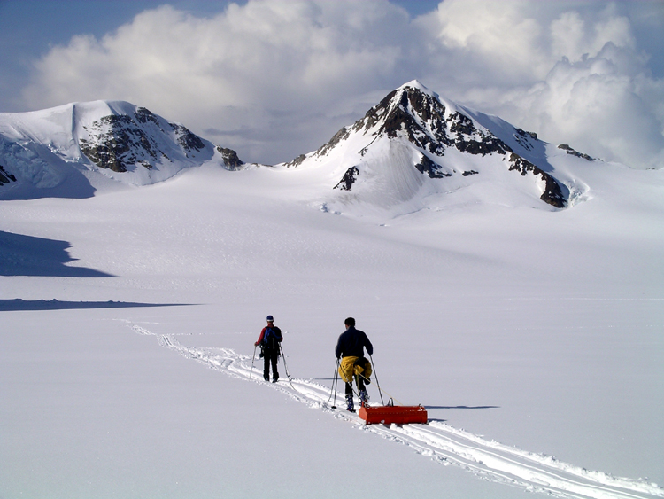 Ben Gross and Seth Campbell collecting ground profiling radar data on a grid on the Mt. Russell Plateau/Upper Yetna Glacier