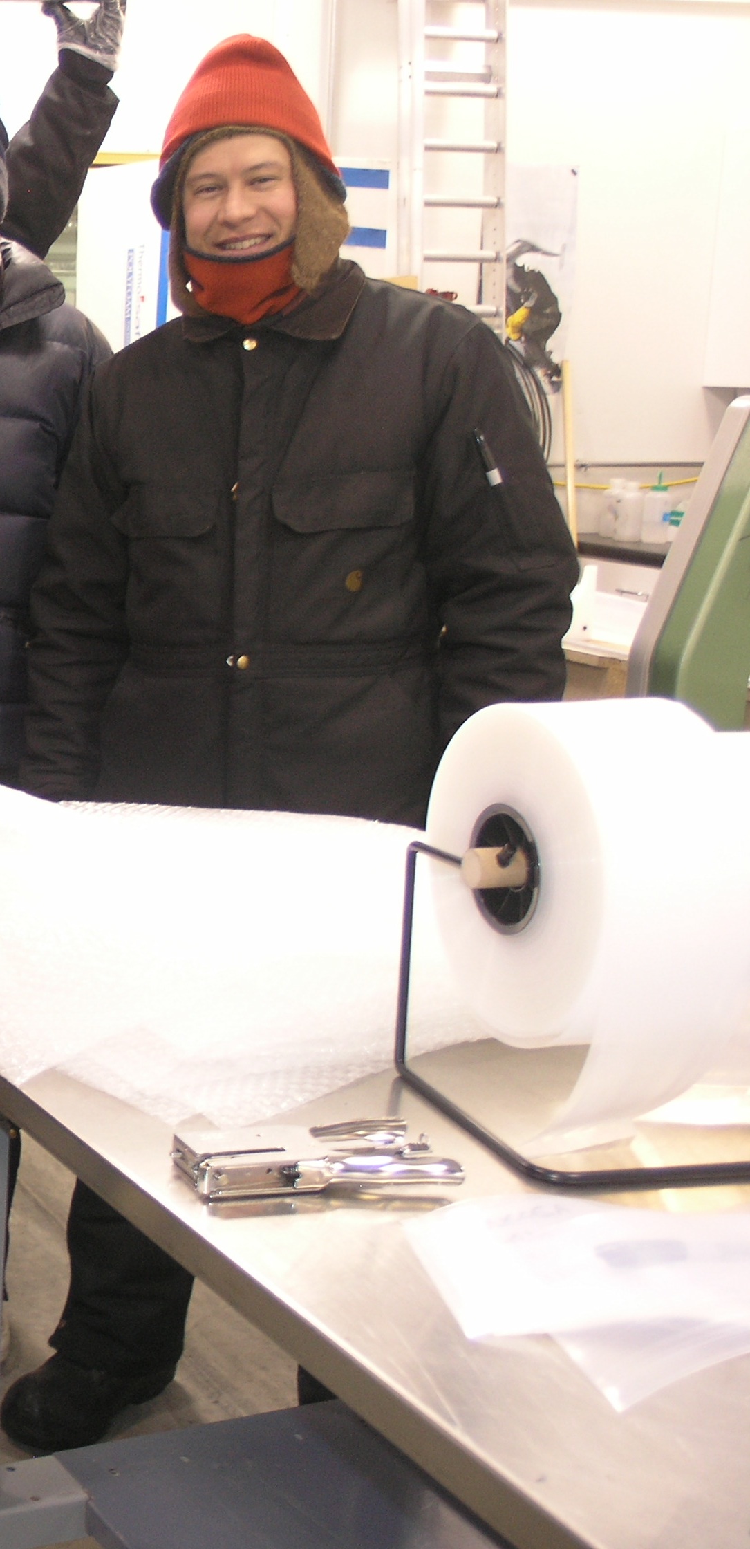 Eric Cravens during a core processing line at the National Ice Core Laboratory (NICL)